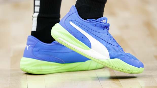 Blue and green Puma Fusion Nitro shoes.